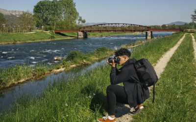 young-hiker-taking-photo-idyllic-river